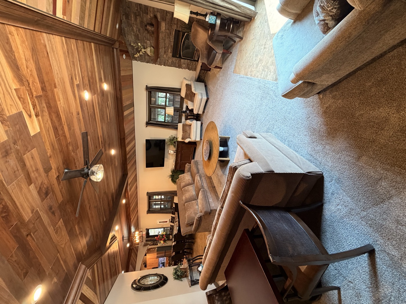 Another view across the great room seating toward the fireplace