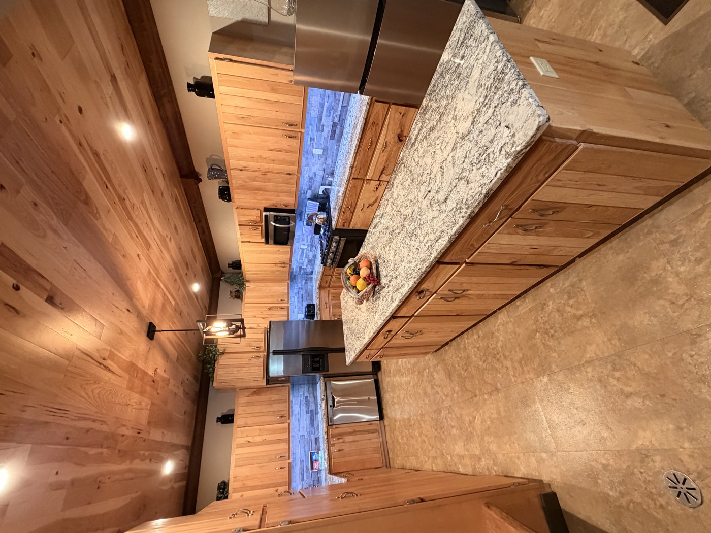 The kitchen with granite counters and full-size appliances